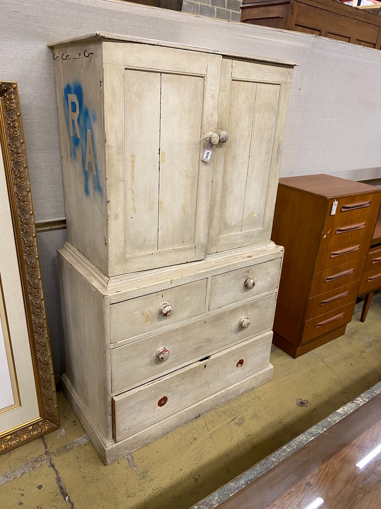 A Victorian painted pine two door press cupboard, width 97cm, depth 51cm, height 164cm